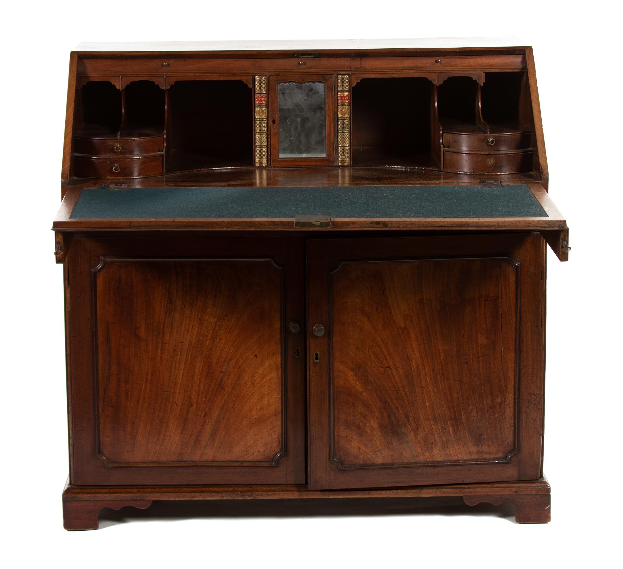 A George III Mahogany Slant-Front Desk — THIRD QUARTER 18TH CENTURY