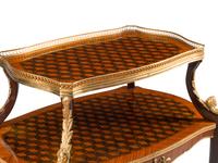 A Louis XV Style Gilt Bronze Mounted Two-Tier Tea Table