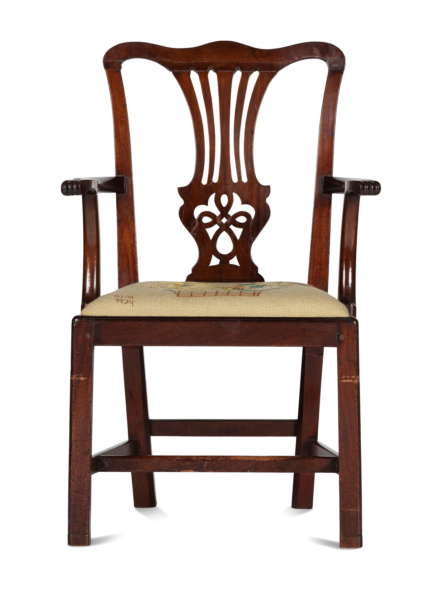 A Chippendale Carved and Figured Mahogany Armchair