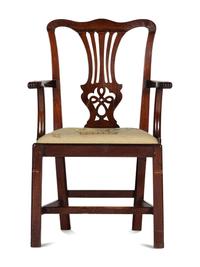 A Chippendale Carved and Figured Mahogany Armchair