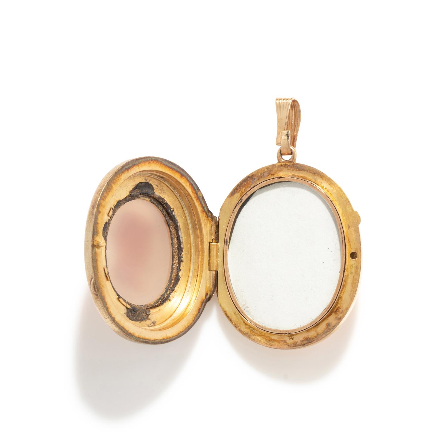 A Neoclassical Gold and Agate Cameo Locket with the God Silenus wearing an Ivy Crown