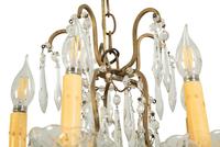 A Gilt Metal and Cut Glass Five-Light Chandelier