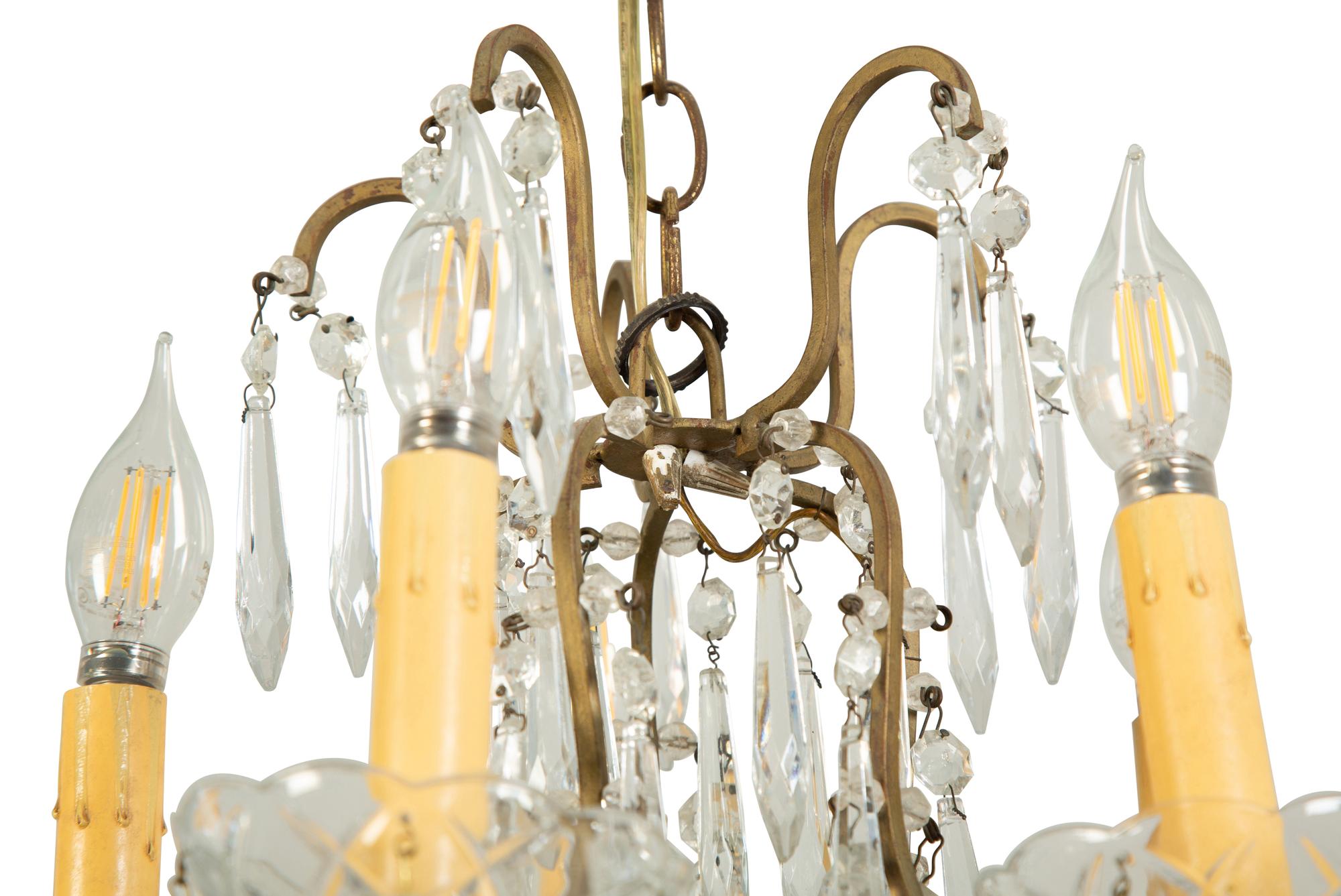 A Gilt Metal and Cut Glass Five-Light Chandelier