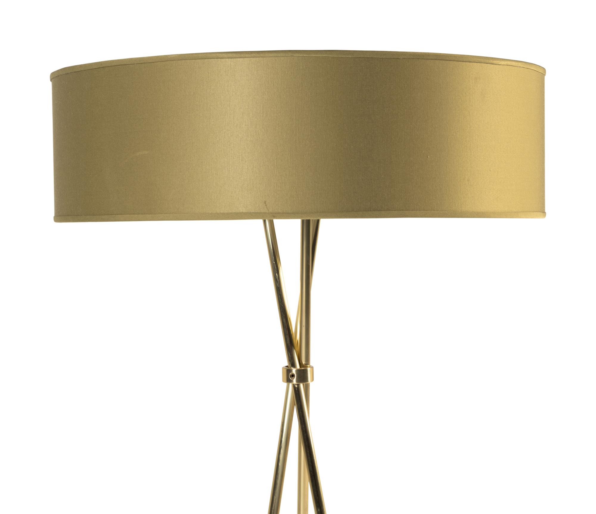 A Contemporary Brass Tripod Floor Lamp