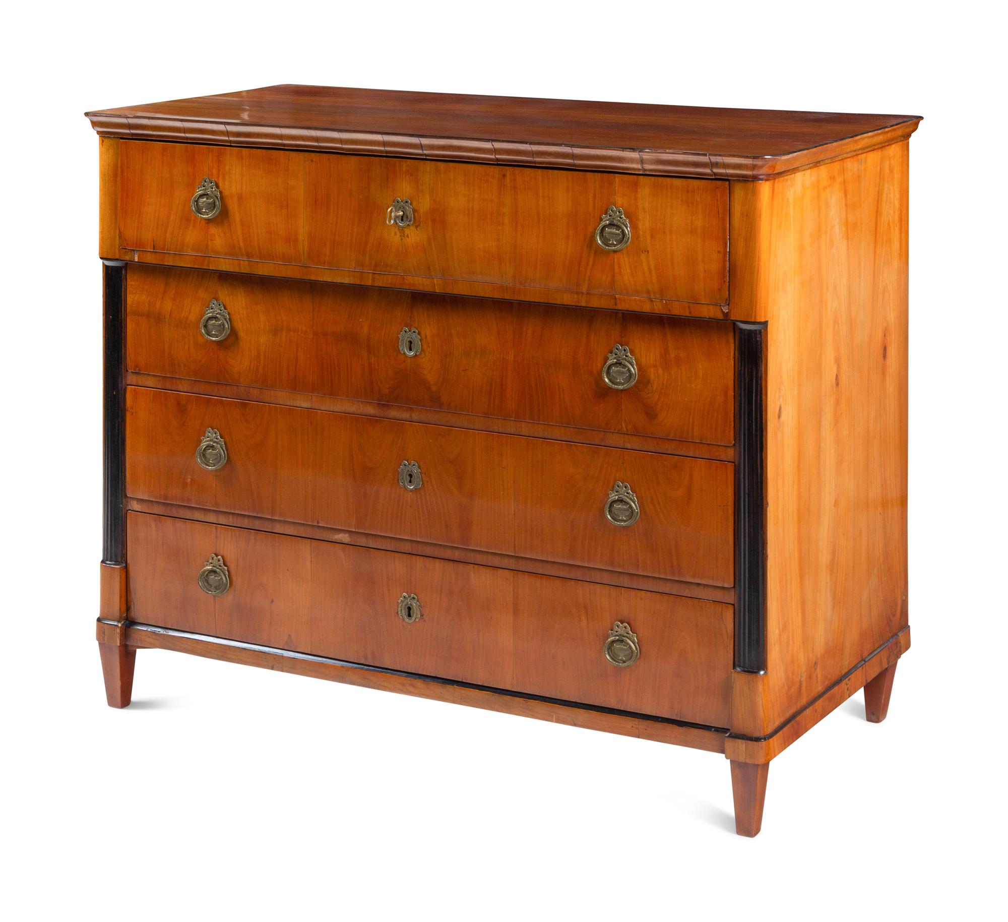 An Austrian Neoclassical Part-Ebonized Walnut Commode