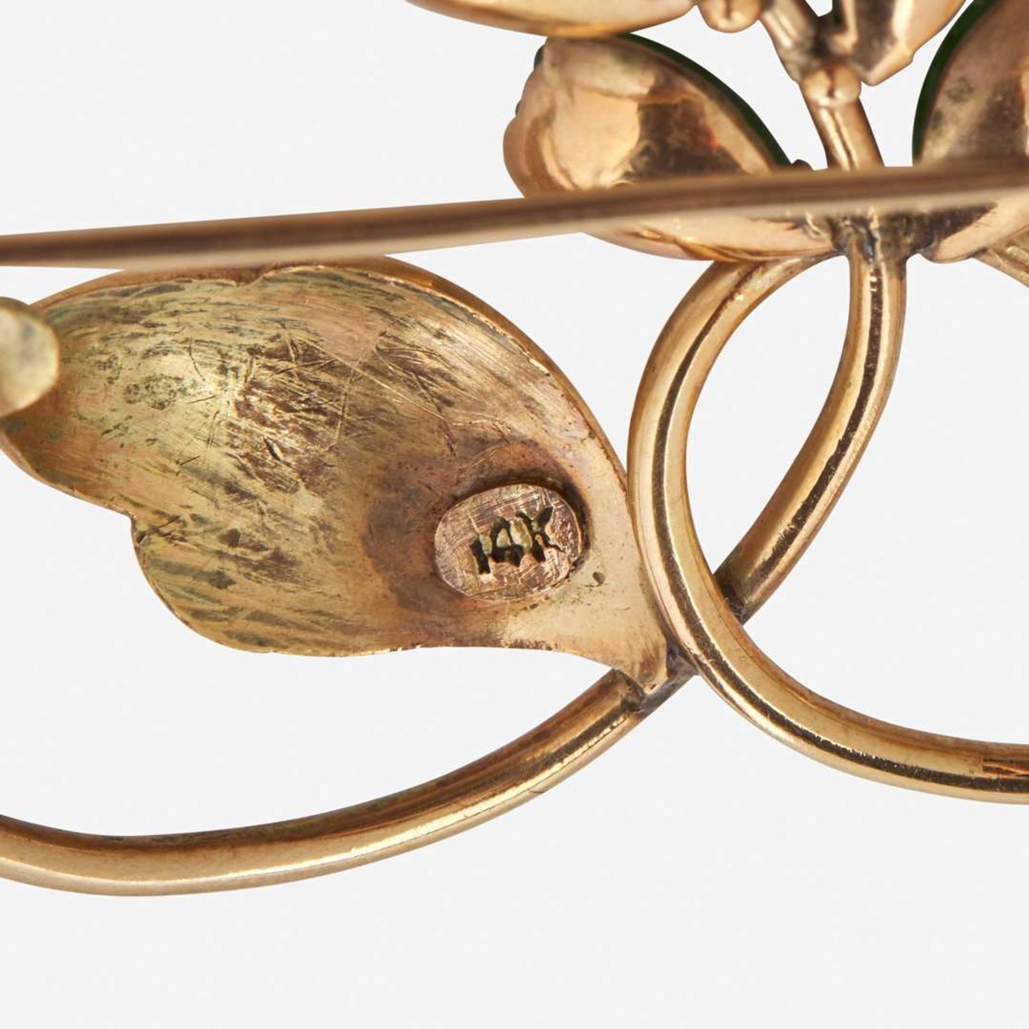 A Collection of Three 14K Yellow Gold Pins