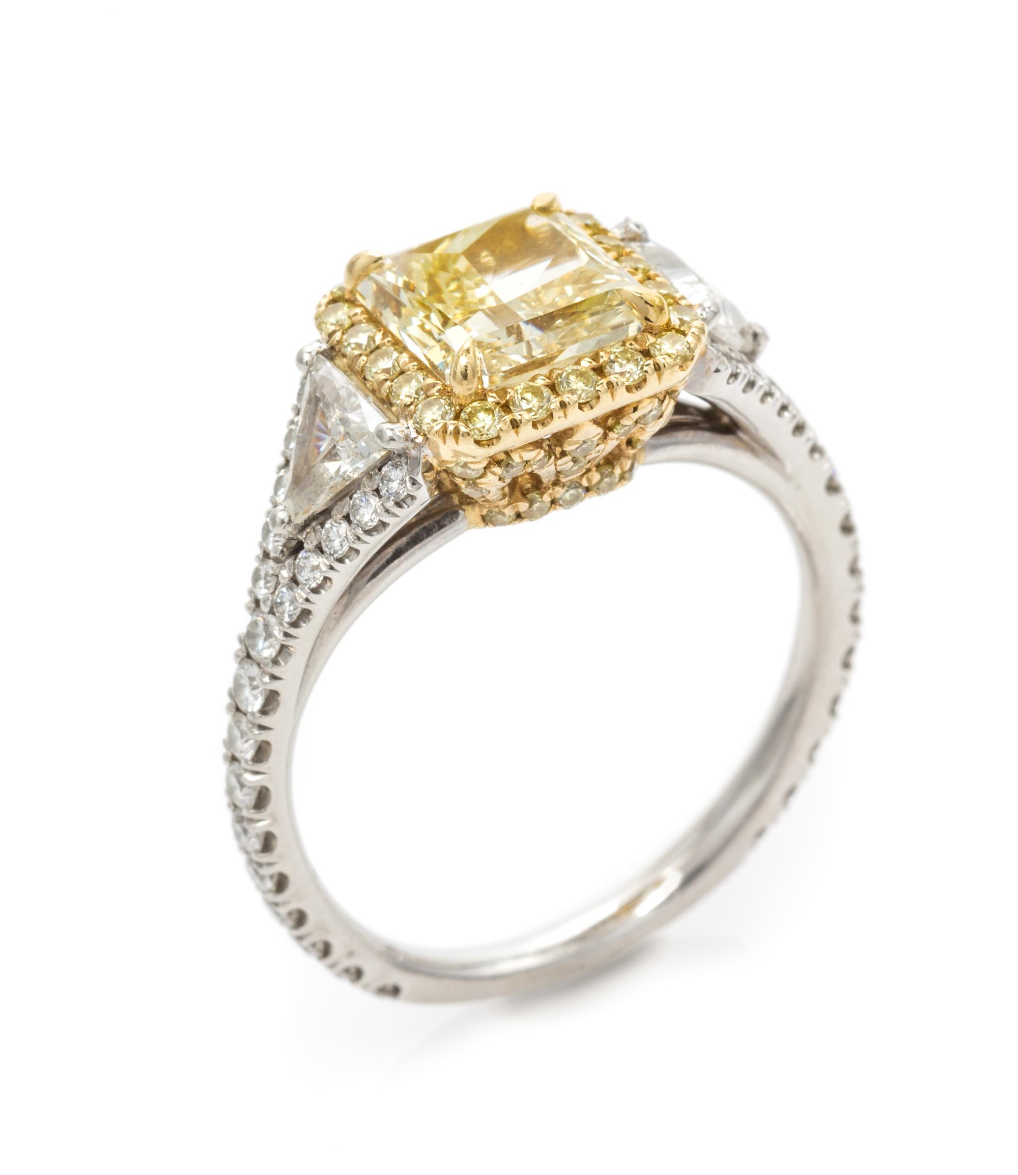 A Platinum, Yellow Gold, Fancy Yellow Diamond, Diamond and Colored Diamond Ring, 4.30 dwts.