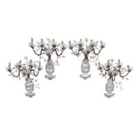 A Set of Four Silvered Metal and Rock Crystal Sconces