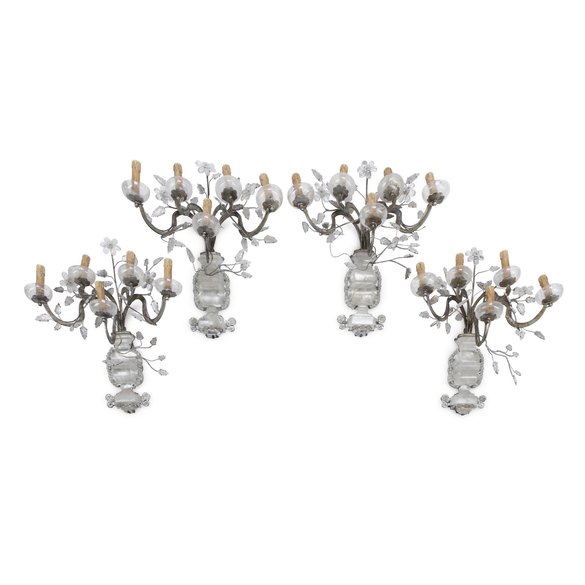 A Set of Four Silvered Metal and Rock Crystal Sconces