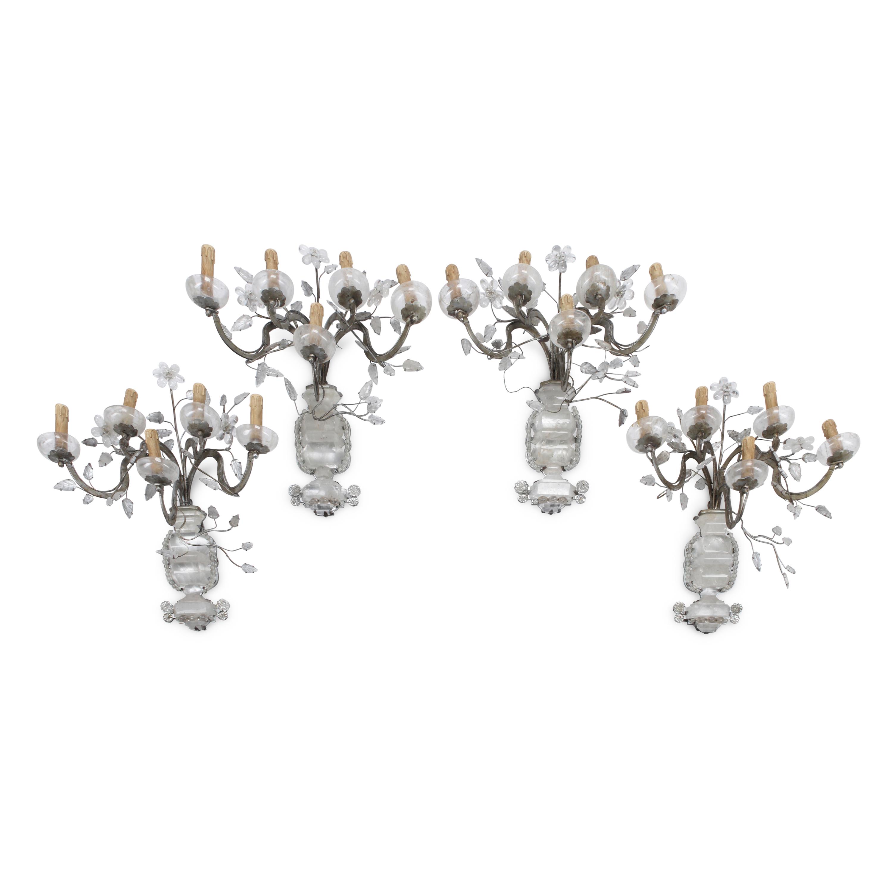 A Set of Four Silvered Metal and Rock Crystal Sconces