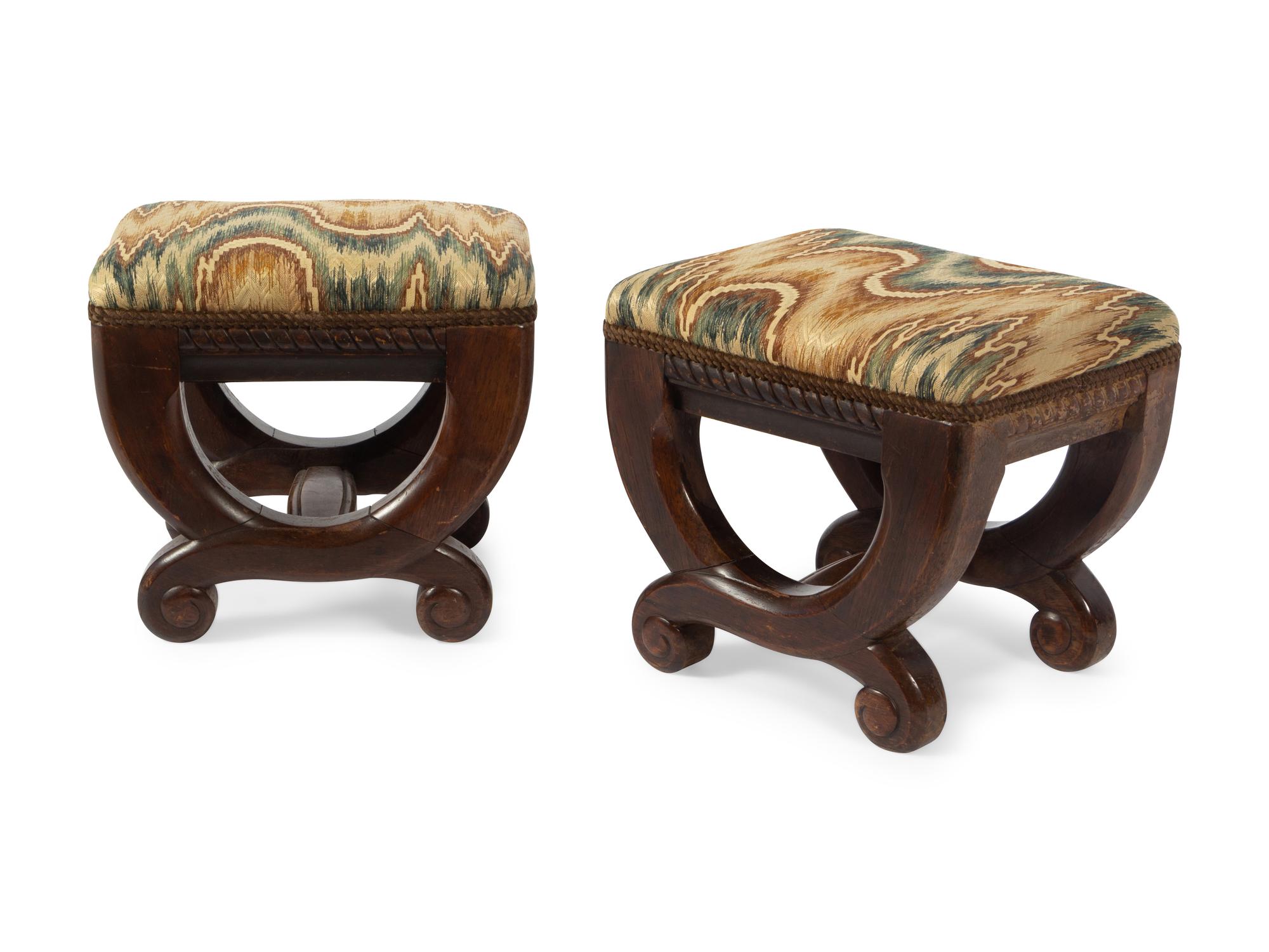 A Pair of Continental Carved Tabourets