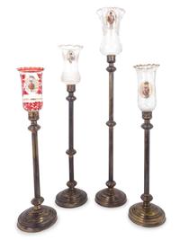 Four Brass and Enameled Glass Hurricane Candlesticks for the Persian Market