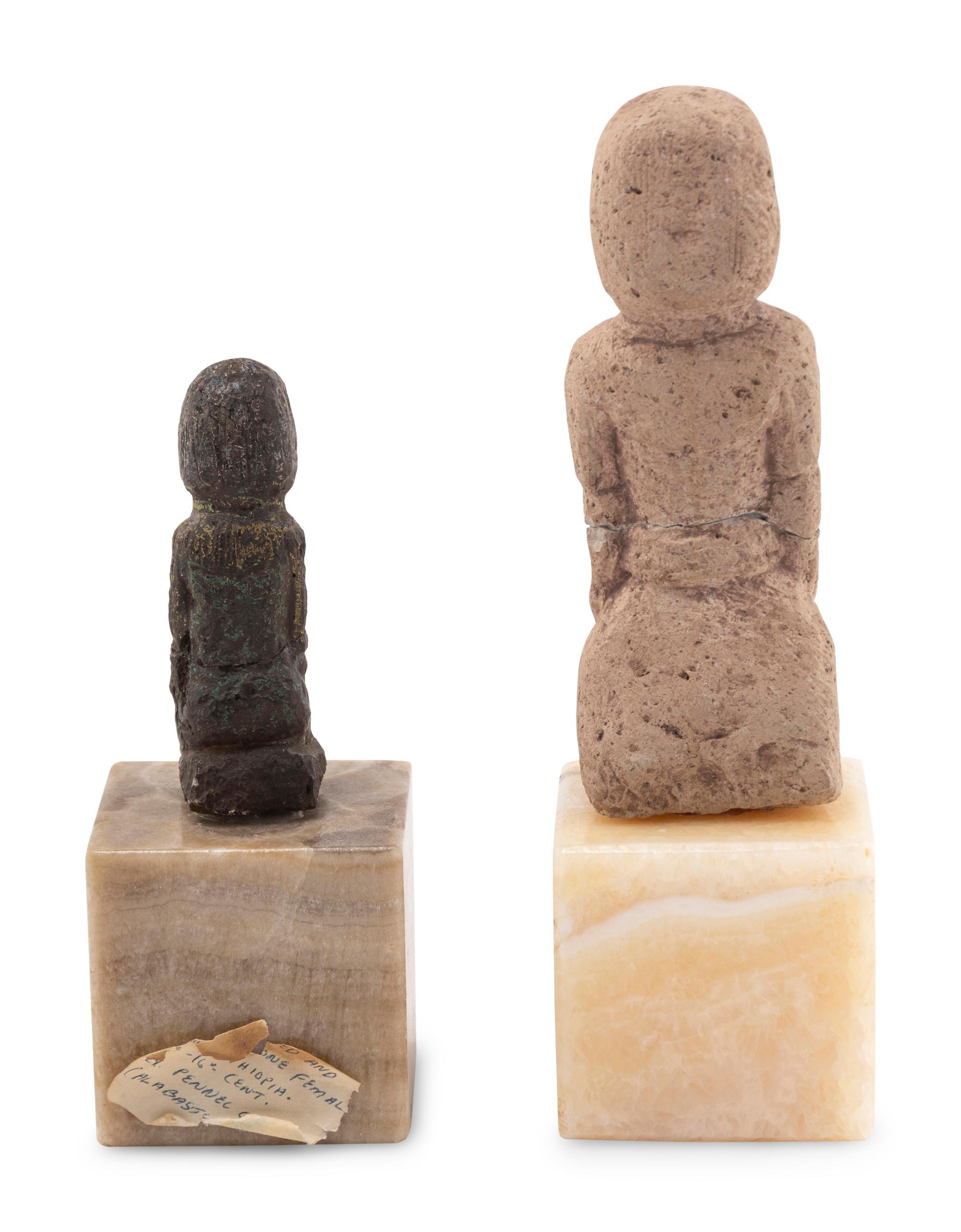Two Carved Stone Figures