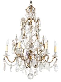 A Louis XV Style Gilt Bronze and Crystal Six Light Chandelier Height 34 x diameter 24 inches. — 19TH CENTURY