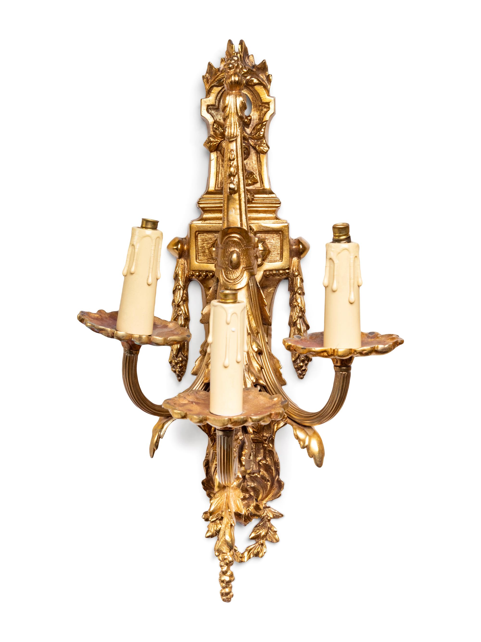 A Pair of Neoclassical Gilt Bronze Three-Light Sconces