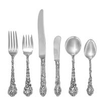 An American Silver Flatware Service, Gorham Mfg. Co., Providence, RI, Versailles pattern, comprising: 12 dinner knives 12 dinner forks