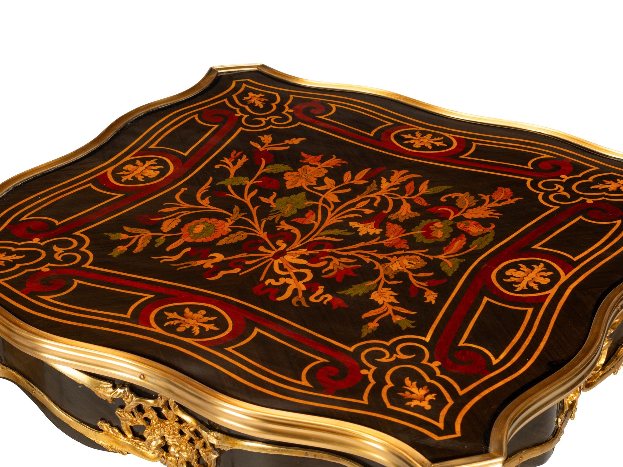 A Pair of Louis XV Style Gilt Bronze Mounted Marquetry Side Tables