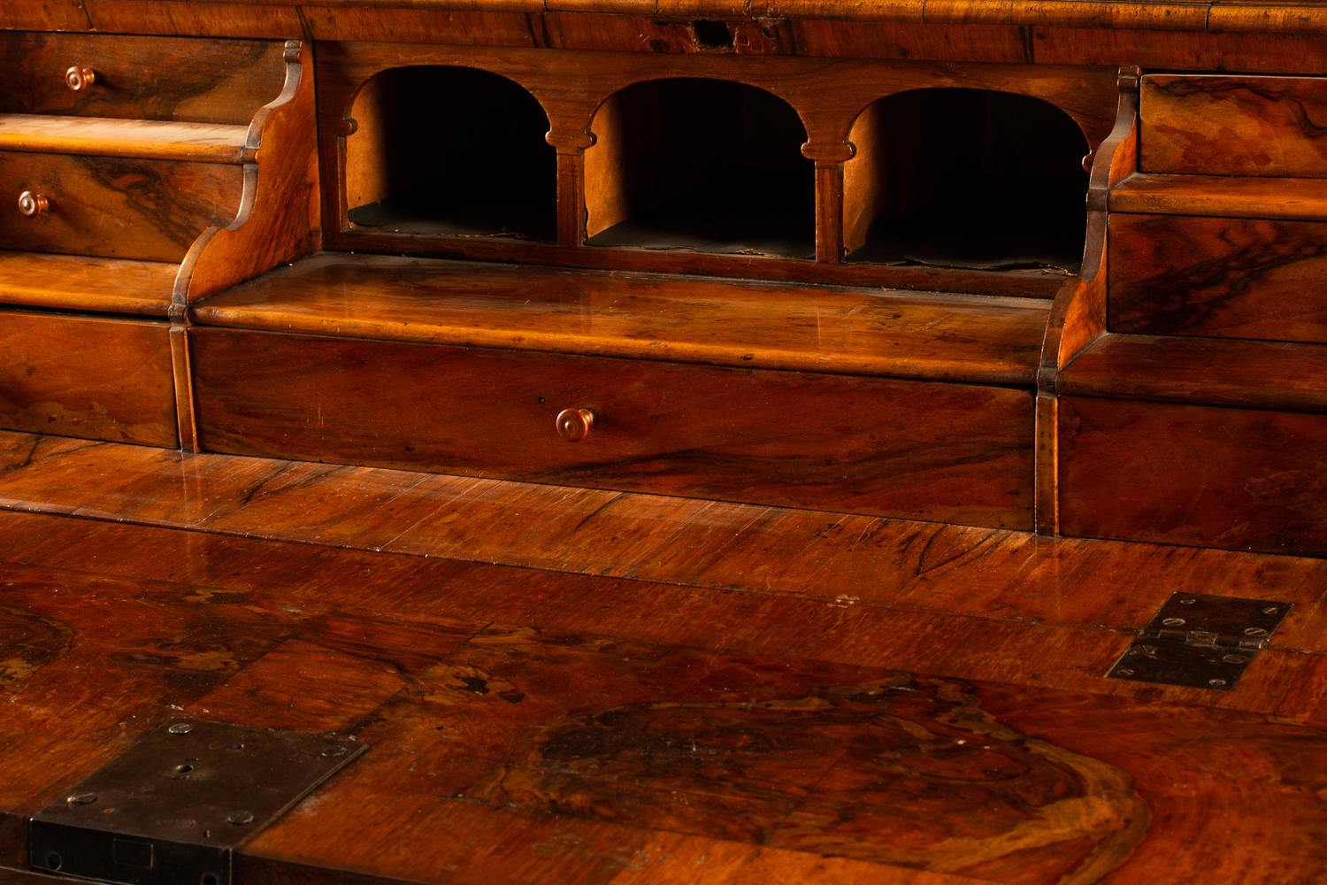 An Austrian Crossbanded Burl Walnut Slant-Front Bureau