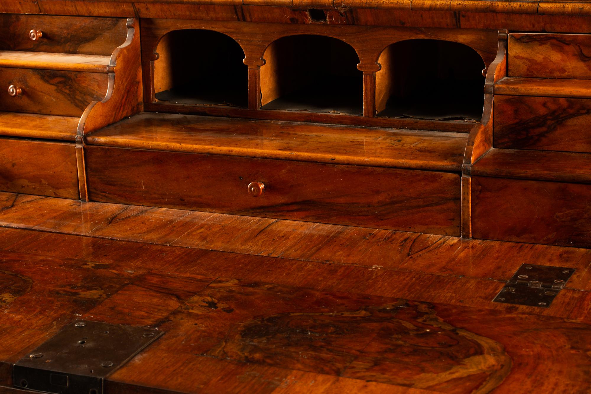 An Austrian Crossbanded Burl Walnut Slant-Front Bureau