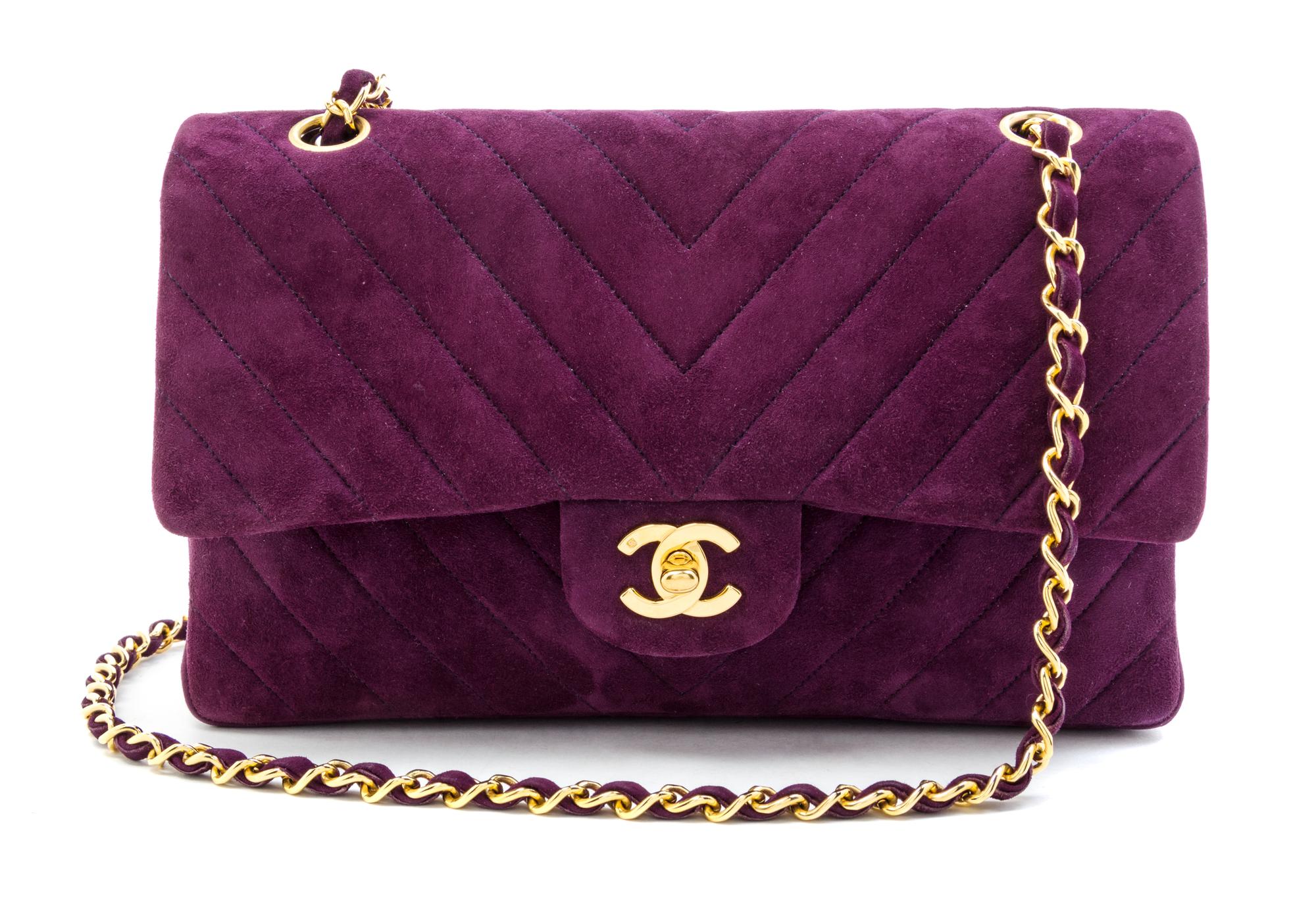A Chanel Purple Suede Chevron Flap Handbag, 10" x 6.5" x 2.5".