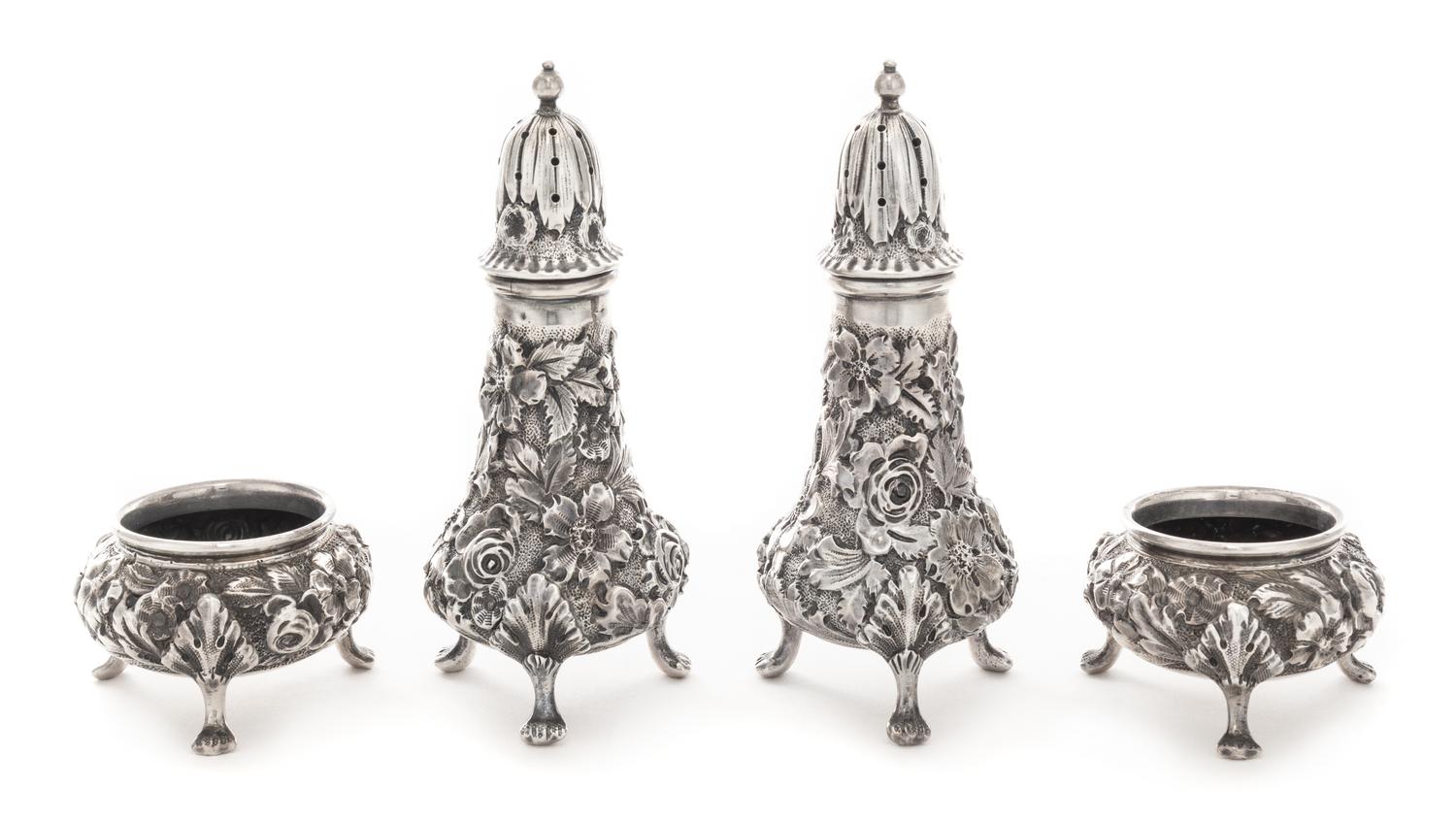 A Pair of American Silver Casters and Salt Cellars, Ritter & Sullivan, Baltimore, MD, each with floral repousse decoration.