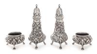 A Pair of American Silver Casters and Salt Cellars, Ritter & Sullivan, Baltimore, MD, each with floral repousse decoration.