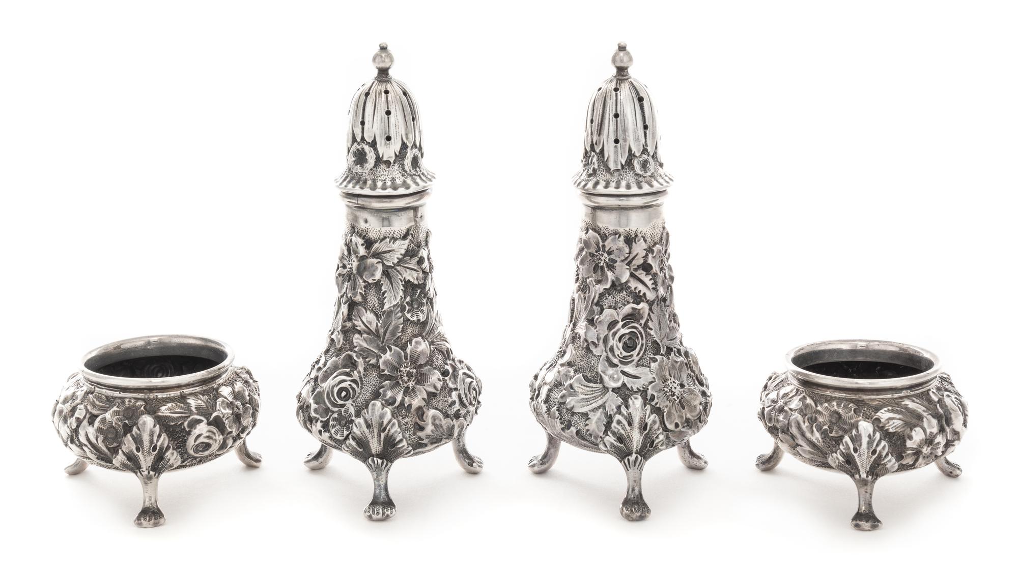 A Pair of American Silver Casters and Salt Cellars, Ritter & Sullivan, Baltimore, MD, each with floral repousse decoration.