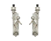 A Pair of Continental Silvered Metal Figural Wall Lights