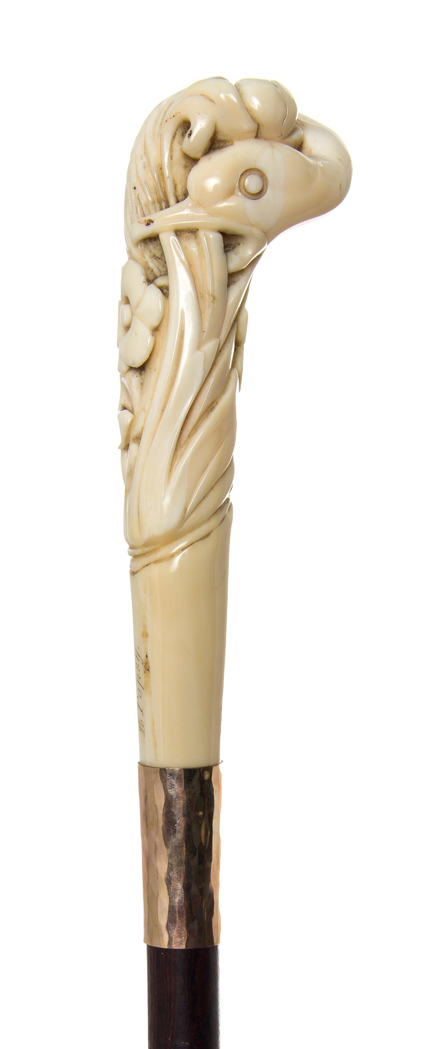 An American Walrus Ivory Handled Walking Stick, Length of handle 5 x length overall 37 1/2 inches.