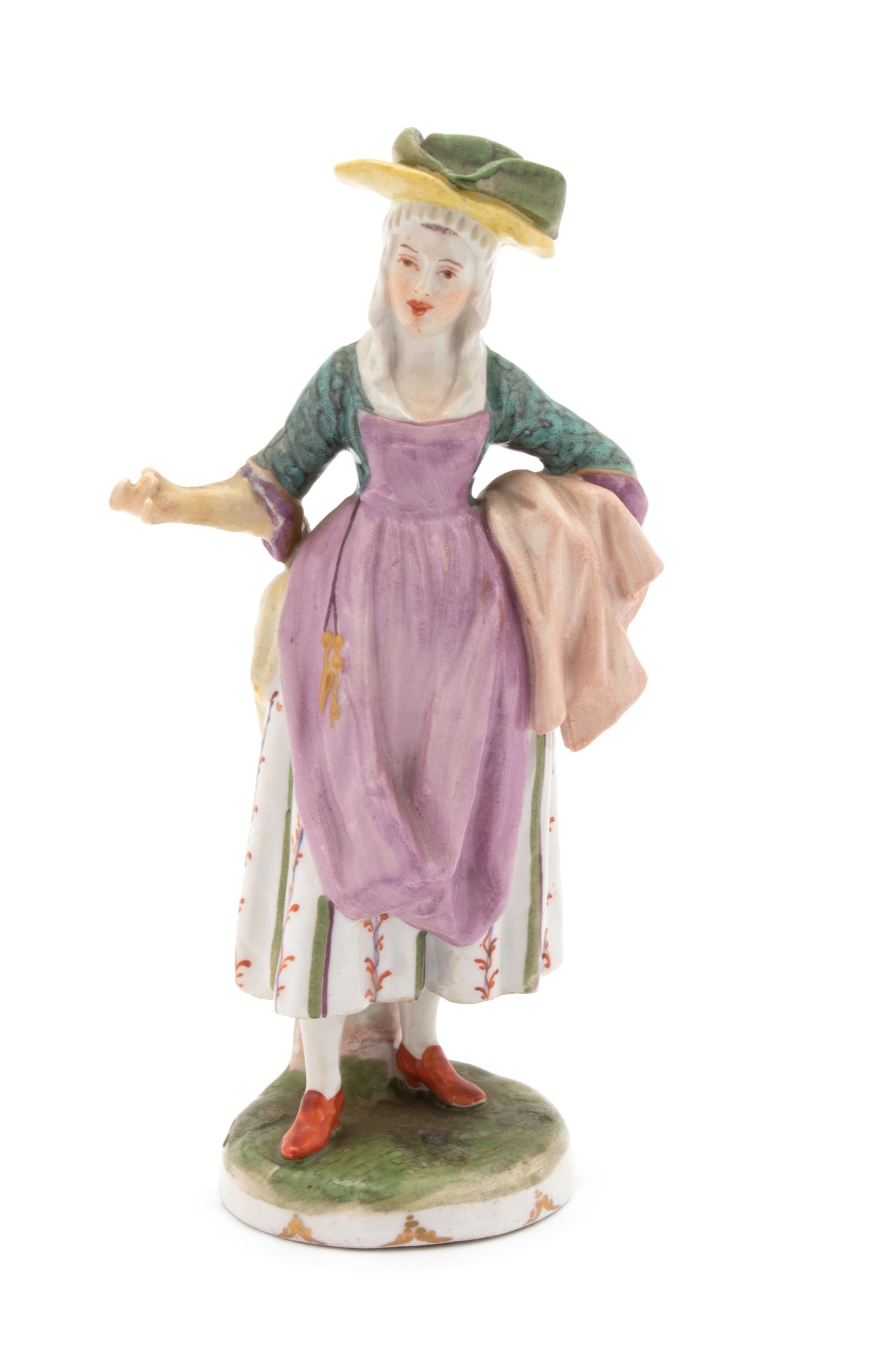 A Vienna Porcelain Figure of a Street Vendor — 19TH CENTURY