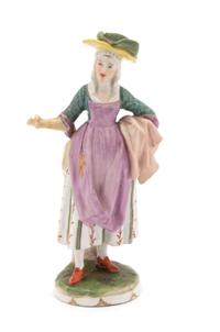 A Vienna Porcelain Figure of a Street Vendor — 19TH CENTURY