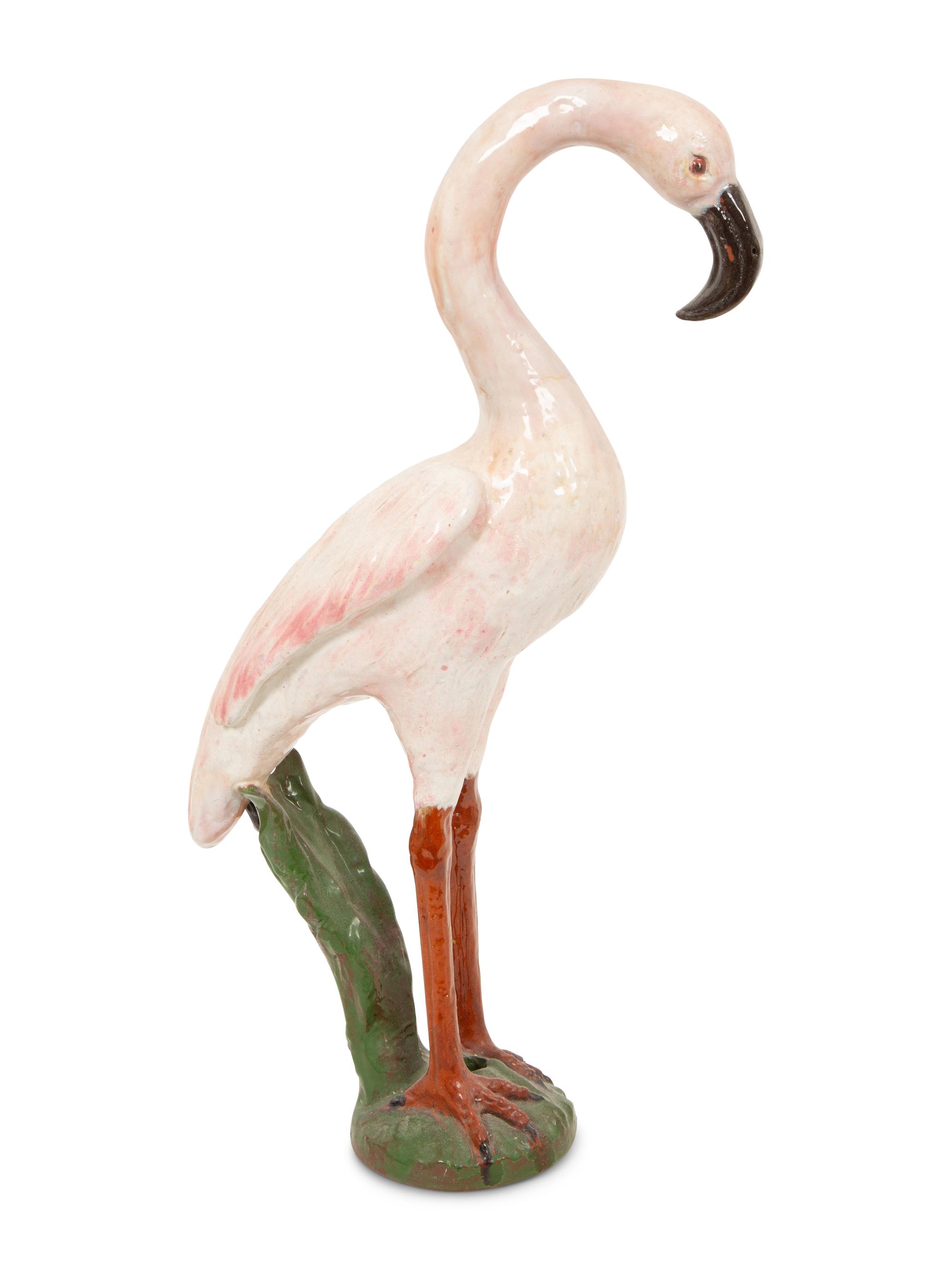 A Tole Peint Model of Two Flamingos and a Glazed Earthenware Model of a Flamingo