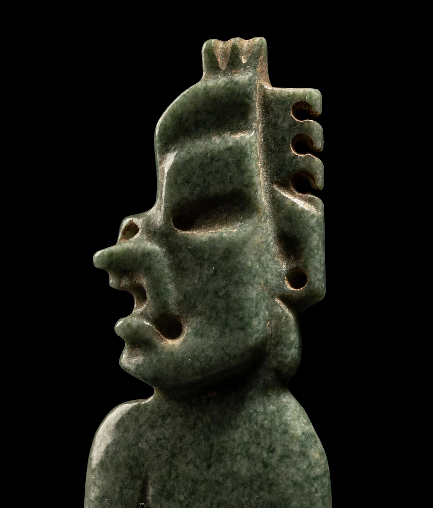 An Olmec Jade Transformation Figure with Crossed Legs