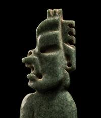An Olmec Jade Transformation Figure with Crossed Legs