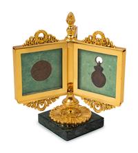 An Empire Style Gilt Bronze Tripartite Frame on Stand