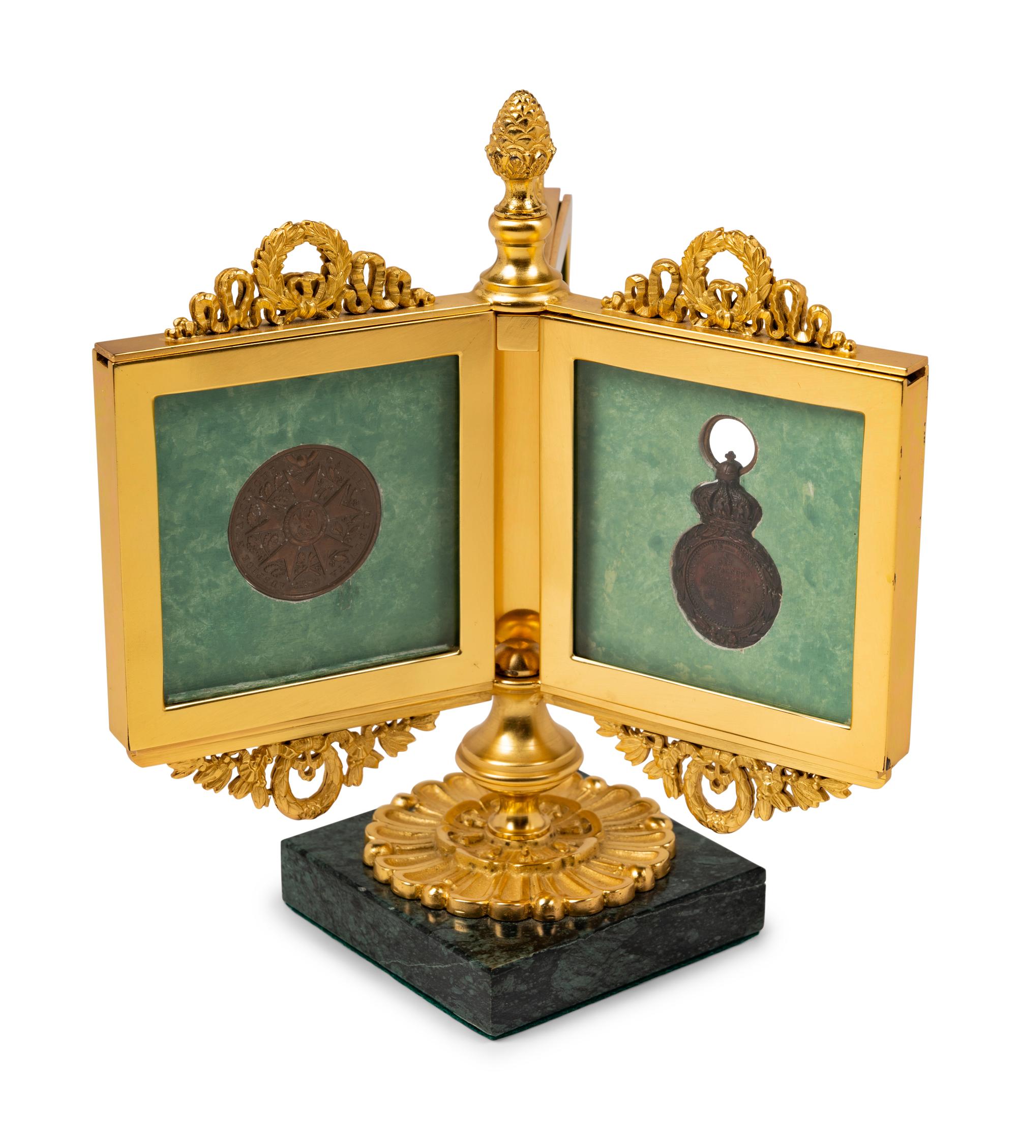 An Empire Style Gilt Bronze Tripartite Frame on Stand