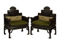 A Pair of Chinese Carved Hardwood Armchairs — 20TH CENTURY