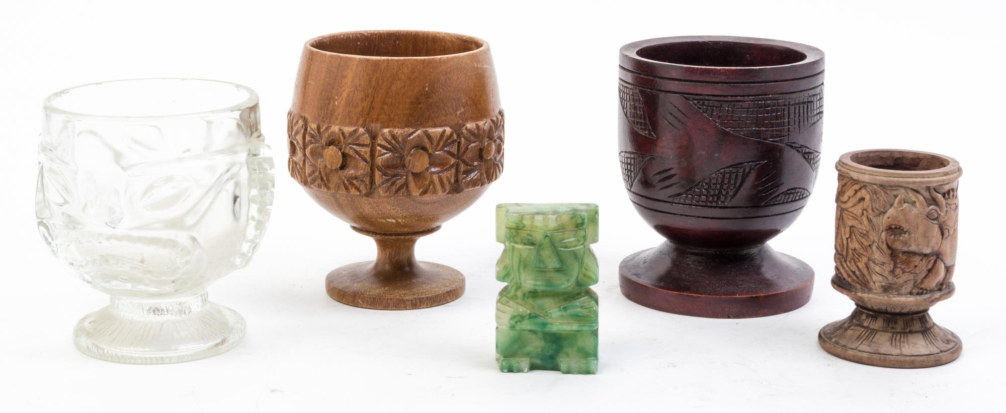 A Group of Four Pacific Themed Drinking Articles Height of tallest 5 1/4 inches.