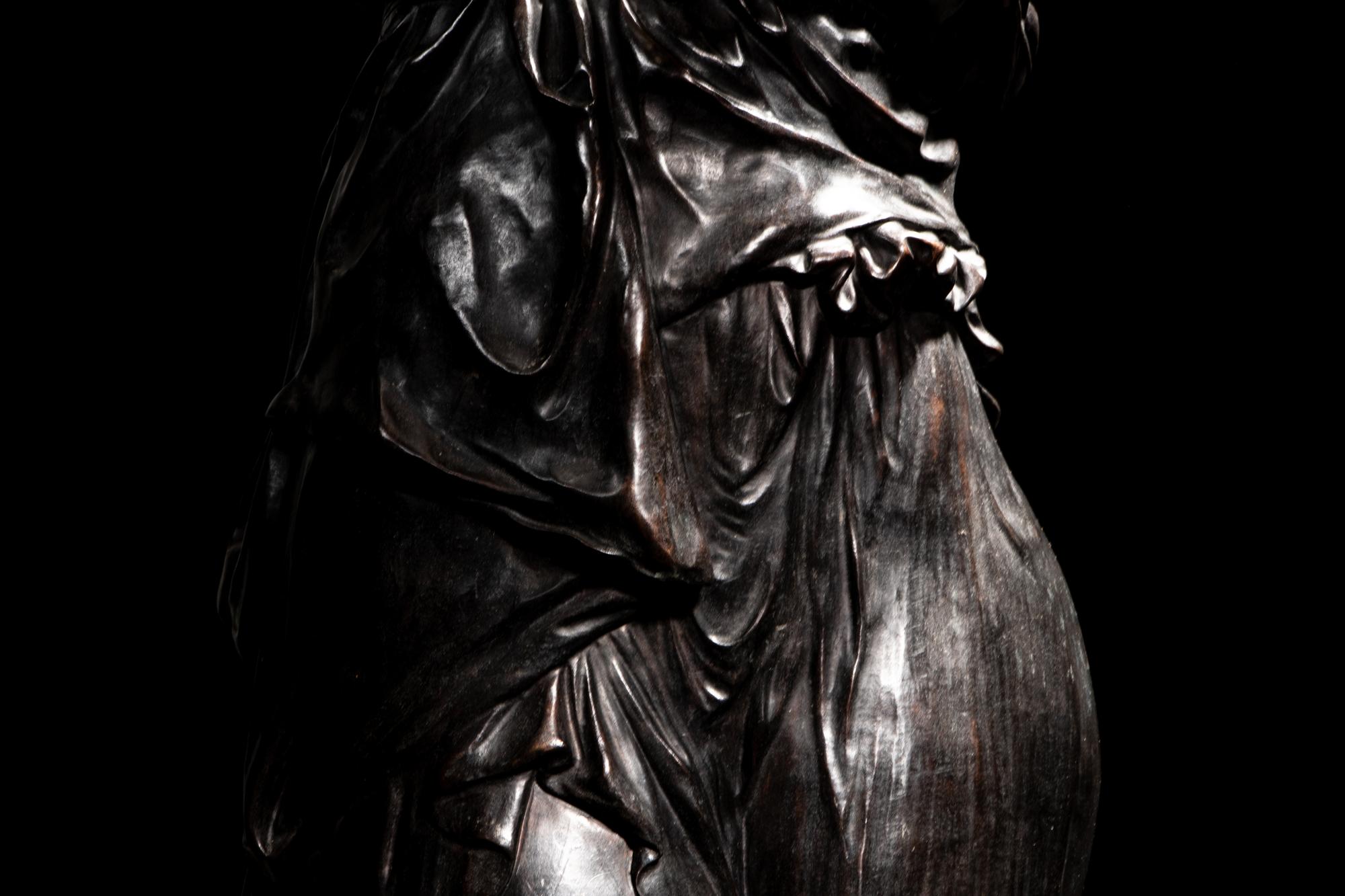 A Pair of Monumental Gilt and Patinated Bronze and Rouge Marble Figural Torchères