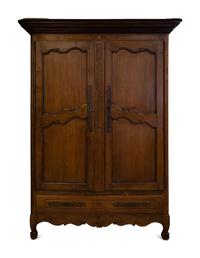 A French Provincial Carved Walnut Armoire