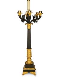 A Pair of Louis Philippe Gilt and Patinated Bronze Seven-Light Candelabra