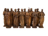 A Set of Twelve Continental Carved Walnut Figures of Apostles