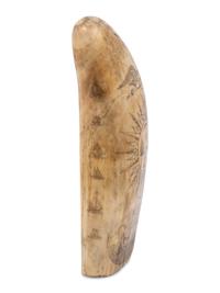 A Scrimshaw Whale Tooth
