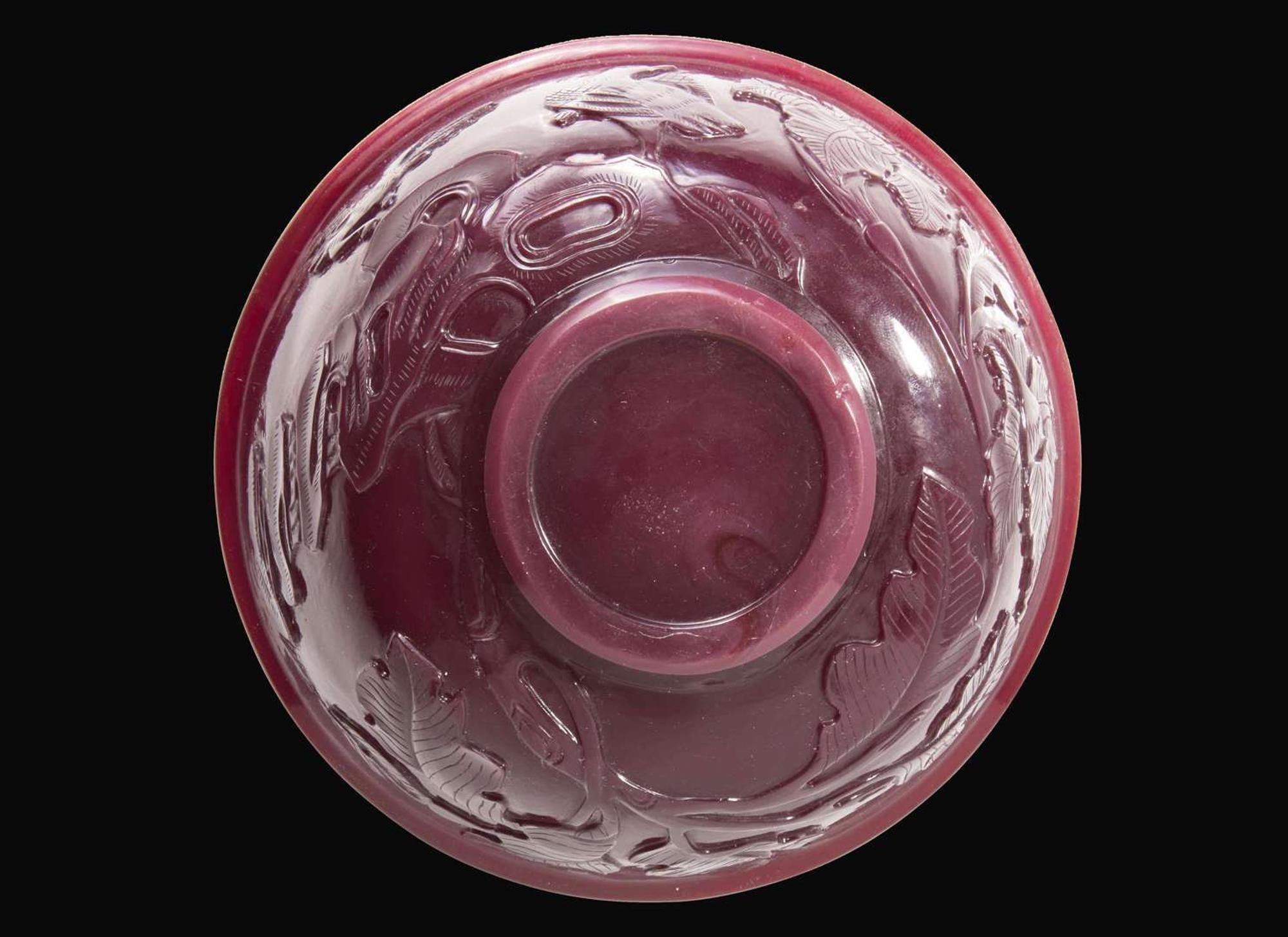 A Chinese carved ruby glass bowl, 18th century 紅琉璃盌配木底座 盌為十八世紀