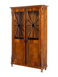 A Biedermeier Part-Ebonized Figured Walnut Bookcase