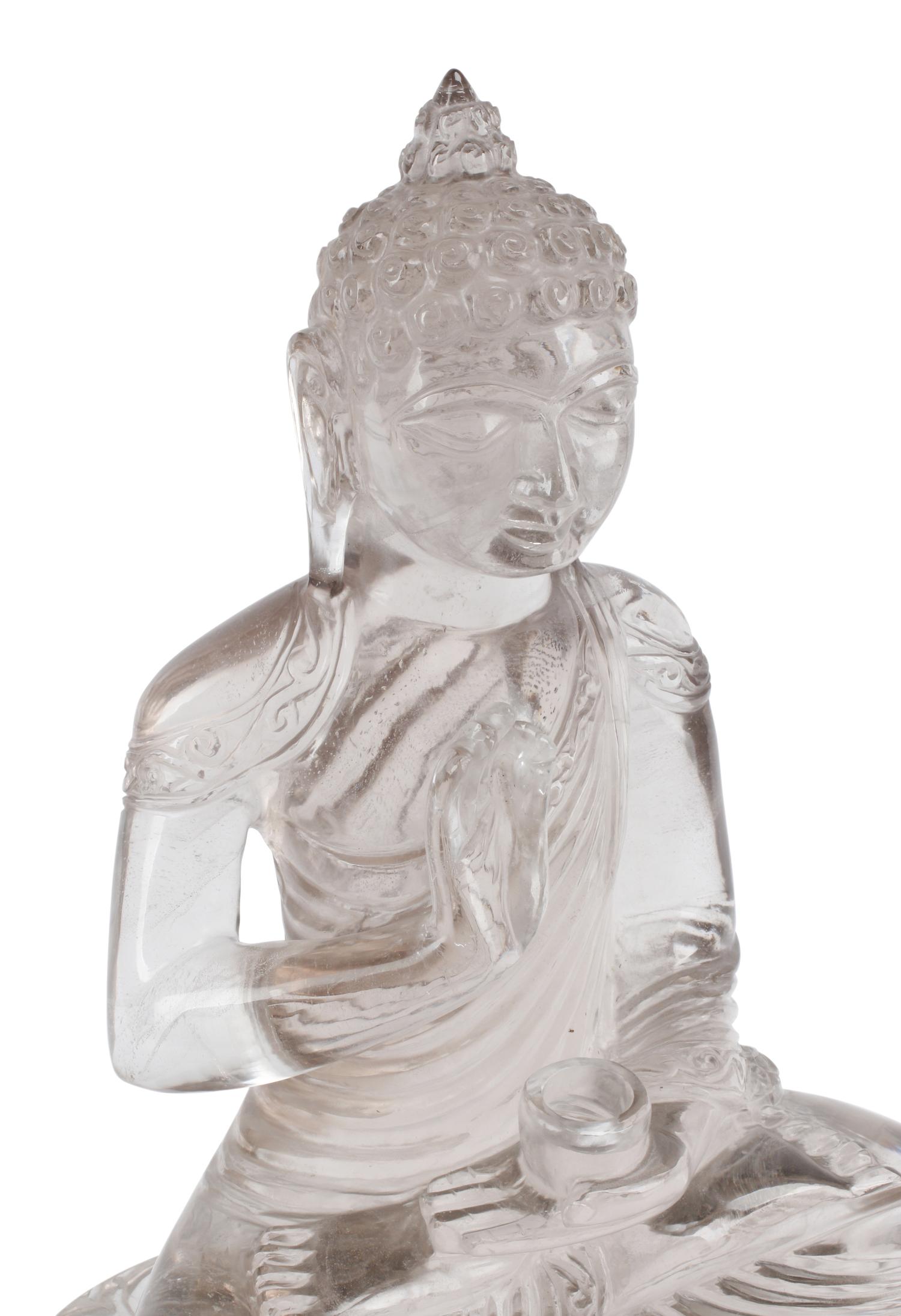 A Large Rock Crystal Seated Figure of Buddha
