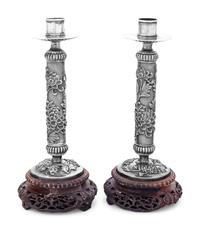 A Pair of Silver Candlesticks