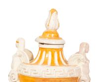 A Pair of Italian Glazed Terracotta Covered Urns