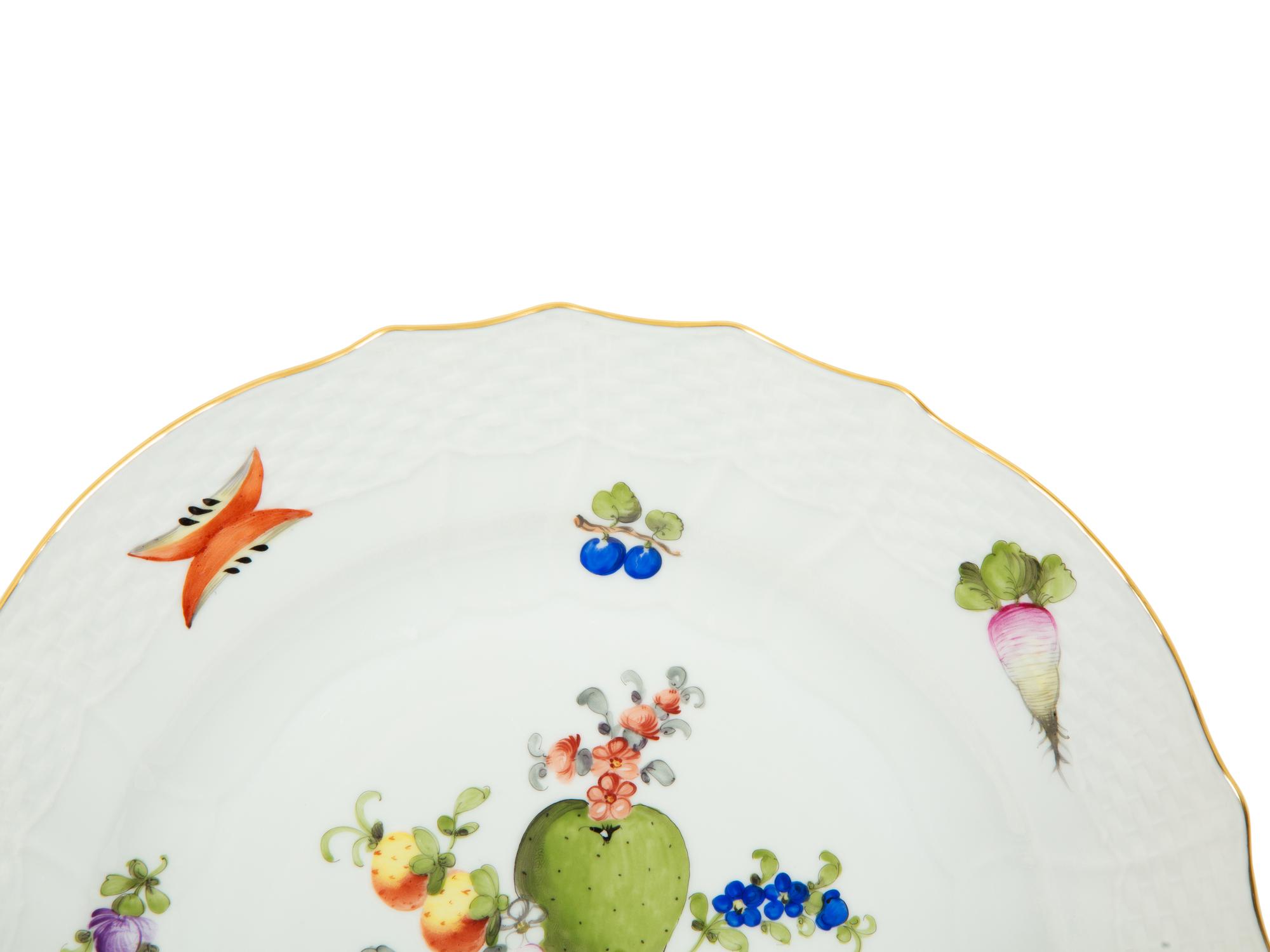 A Herend Fruits and Flowers Porcelain Dinner Service