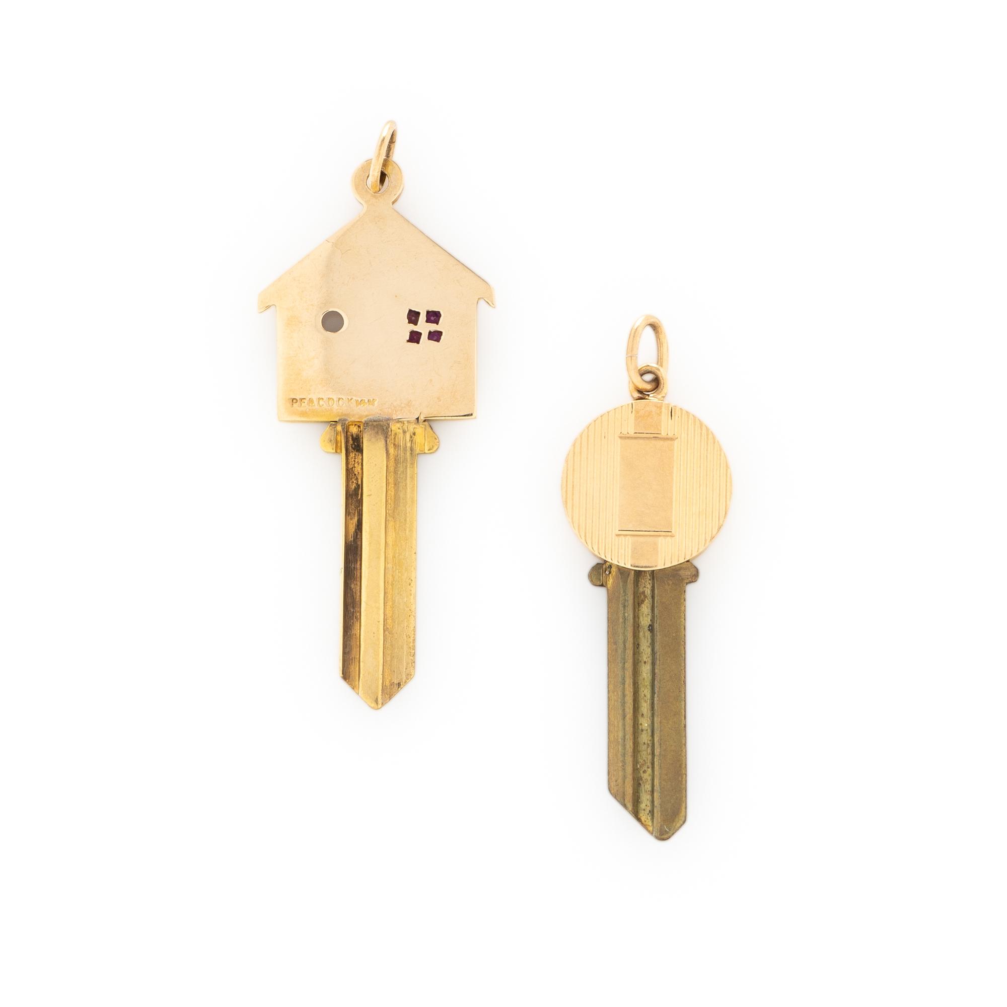 COLLECTION OF YELLOW GOLD KEY CHARMS